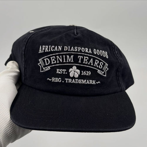 DENIM TEARS ADG CAP BLACK